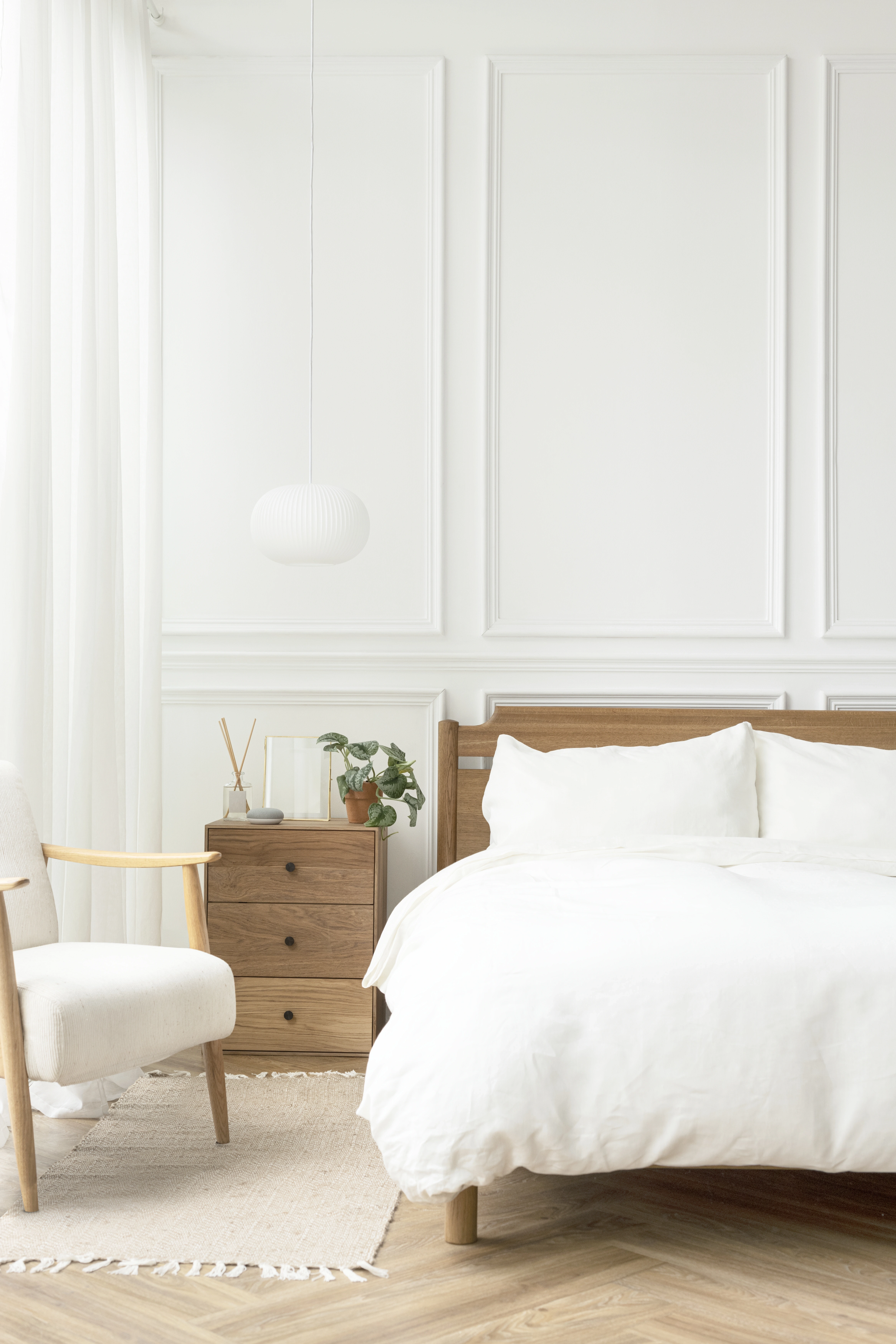 Bright, freshly made bedroom after professional cleaning